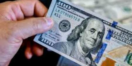 تراجع الدولار إثر توقف مؤقت للهجمات بين واشنطن وطهران