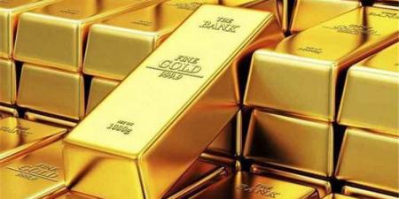 الذهب يتراجع مع صعود الدولار وترقب قرار الفائدة الأمريكية