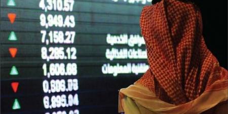 مؤشر "تاسي" يتراجع هامشياً بمنتصف التعاملات وسط أداء متباين للقطاعات القيادية