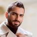 محمد الشرنوبي يثير فضول جمهوره بصورة غامضة.. ورسالة: «جار تحديث المنتج»